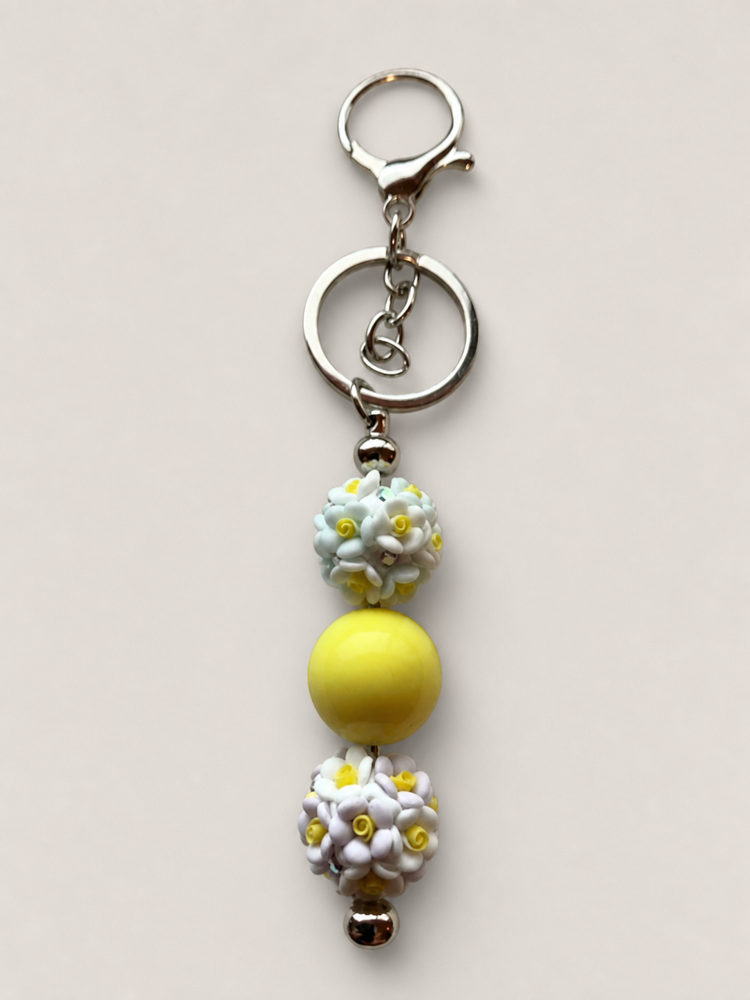 Yellow and white flower bead keychain